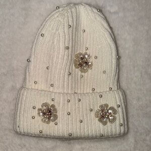 Elegant Cream Beanie with Floral Accents
